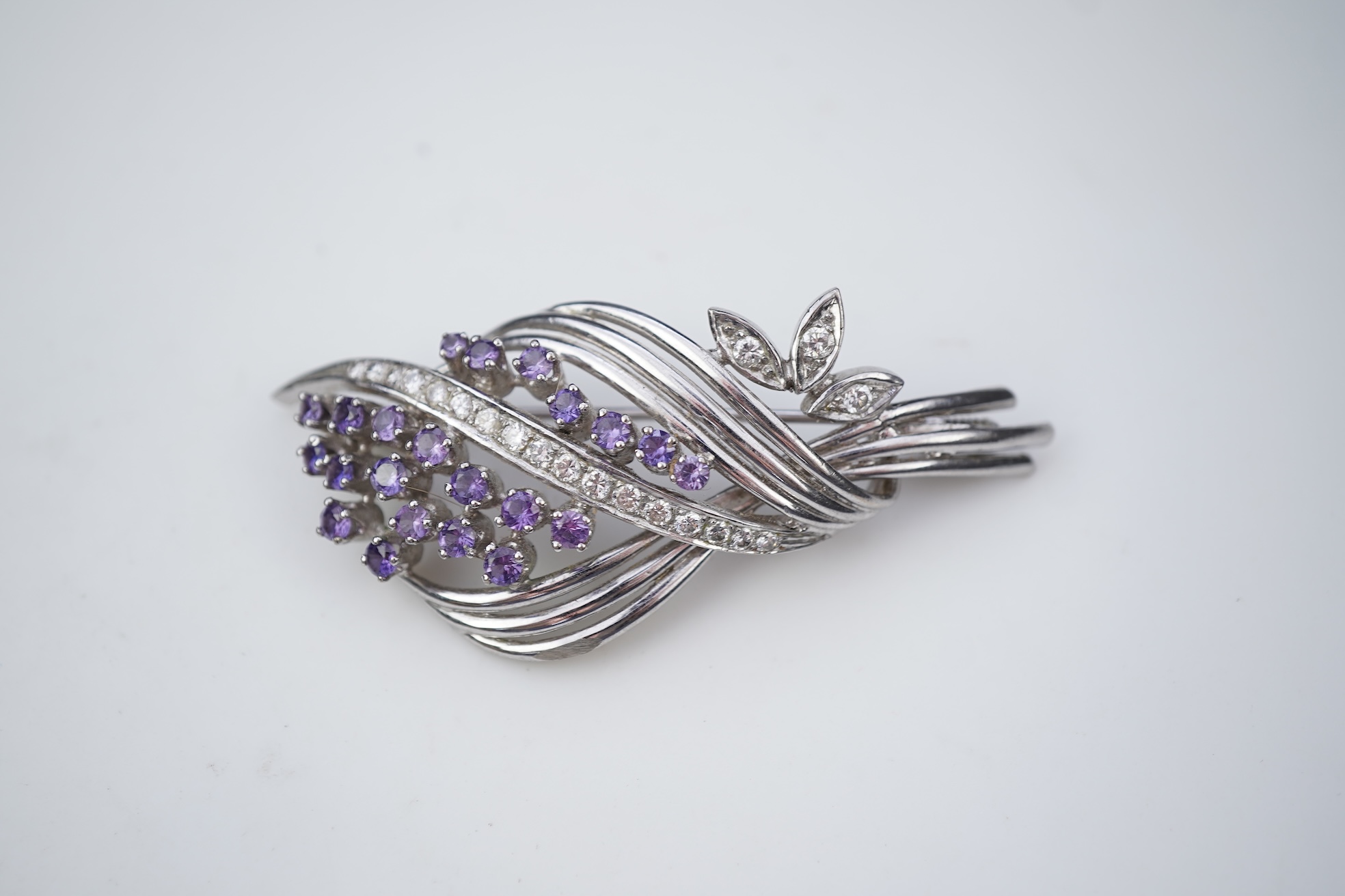 Three rings and a brooch